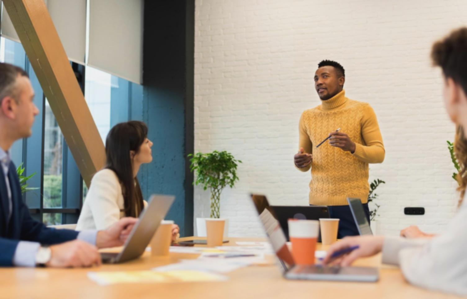 Collaborative workshop environment showing engaged learning participants